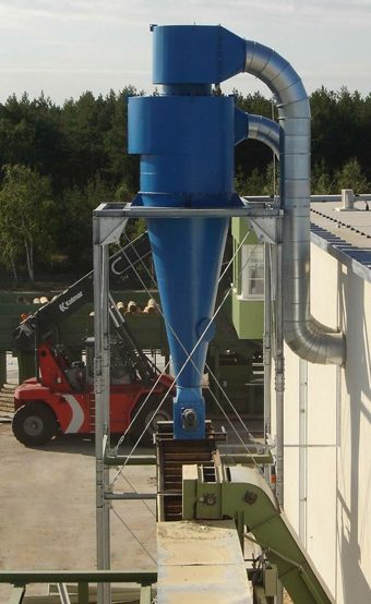 Blue cyclonic separator on a steel support frame