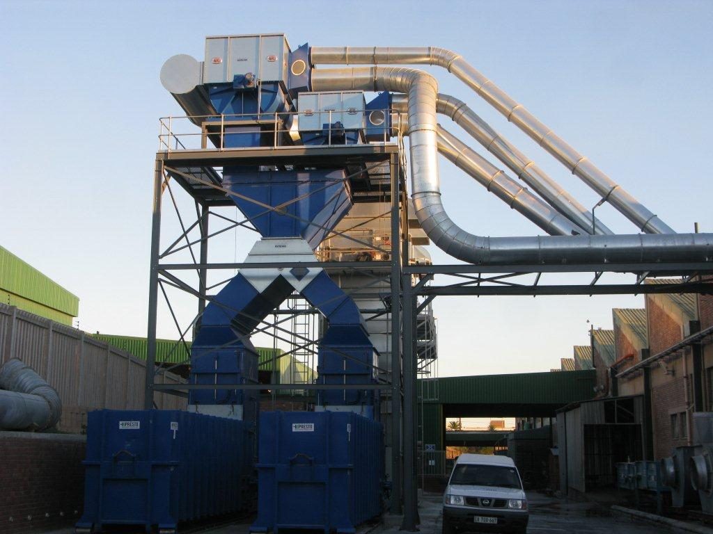 Outdoor paper waste extraction plant with blue hoppers and ducting