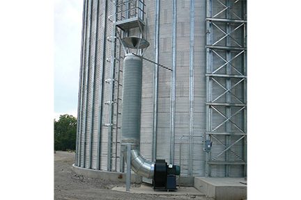 Blower and ducting on a corrugated metal silo